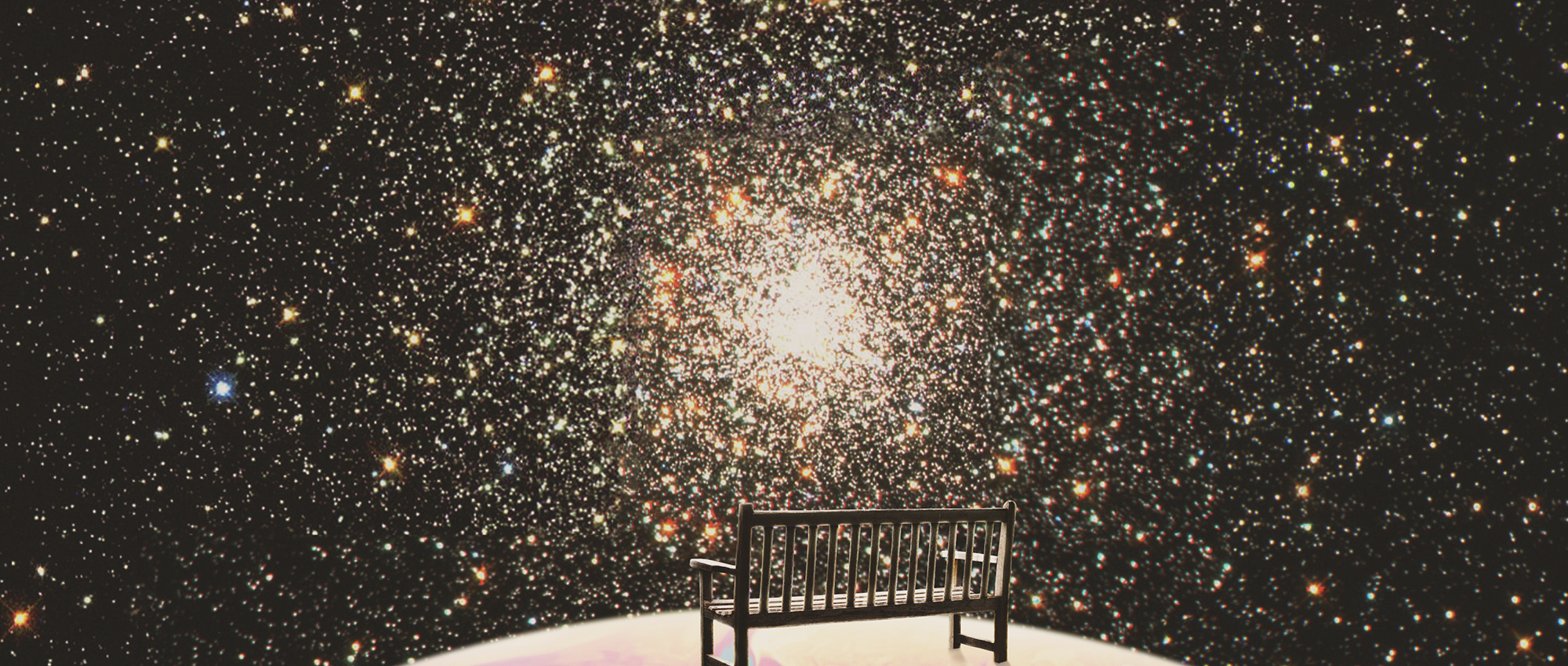 bench under starry night sky