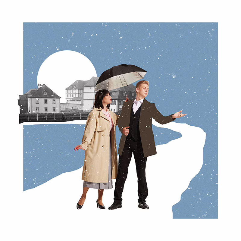 navigating-grief-and-loss-during-the-holida man and woman under an umbrella in the snow